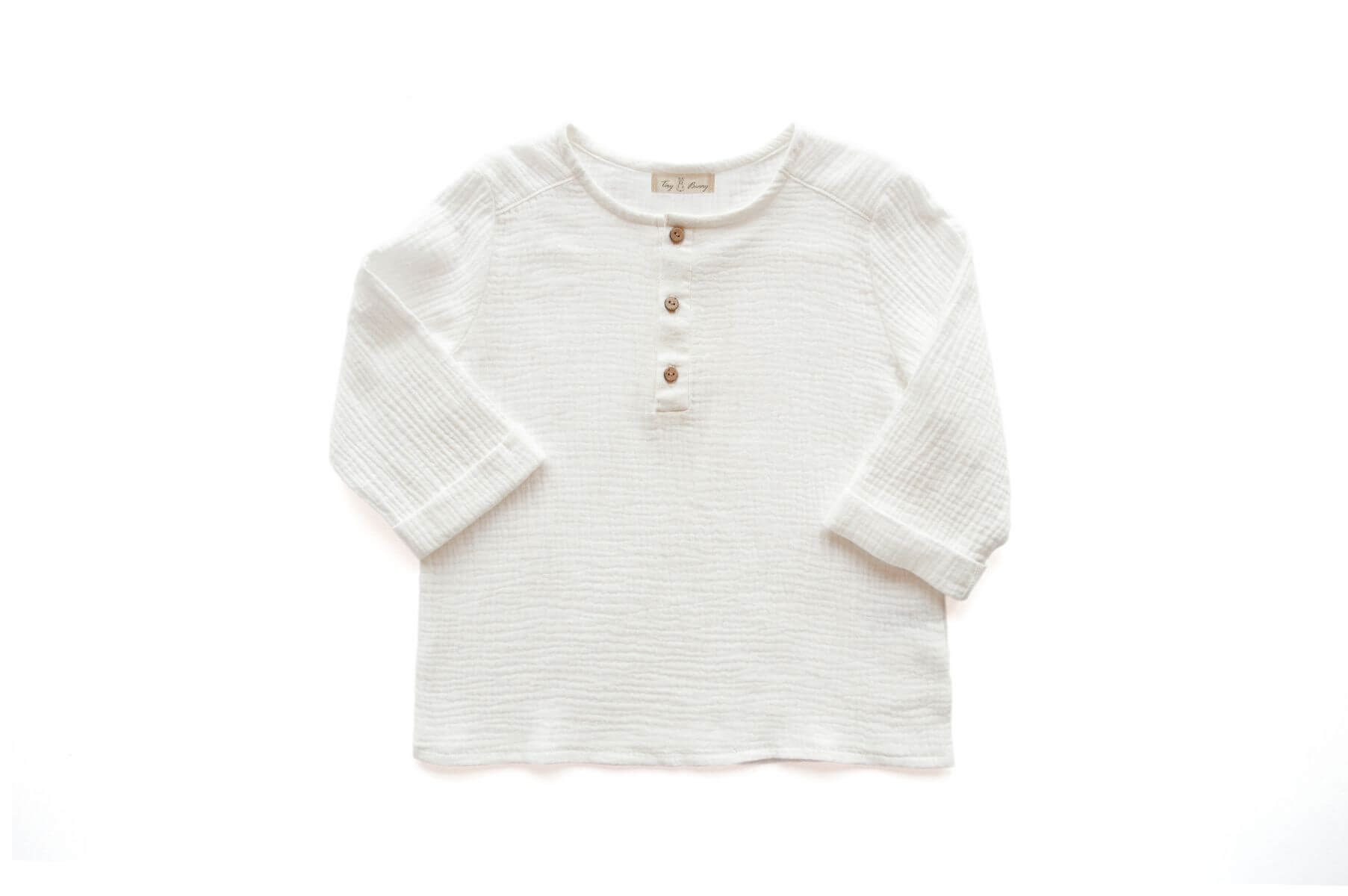 Looking for comfortable and lightweight clothing for your kids to wear during hot and humid weather? MiliMilu's handmade kid's muslin shirt in white is made from organic cotton and is perfect for summer. MiliMilu specializes in eco-friendly and organic kids and baby clothing in Hong Kong and Singapore.