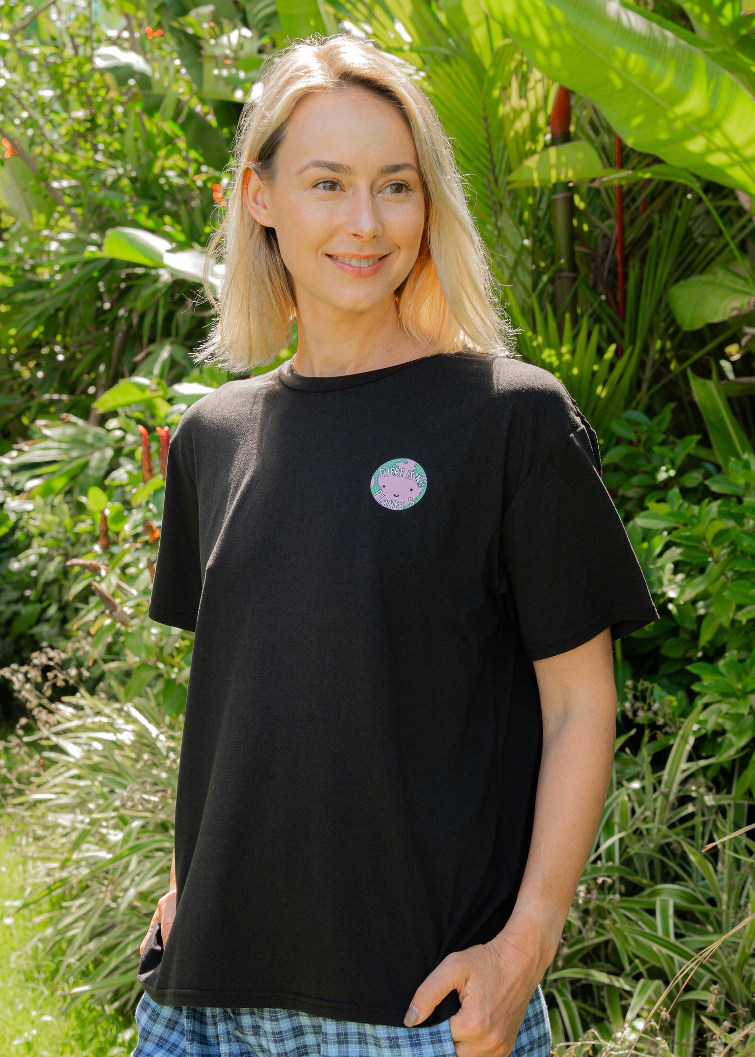 Black bamboo t-shirt with 'There is no planet B' message, sustainable unisex apparel