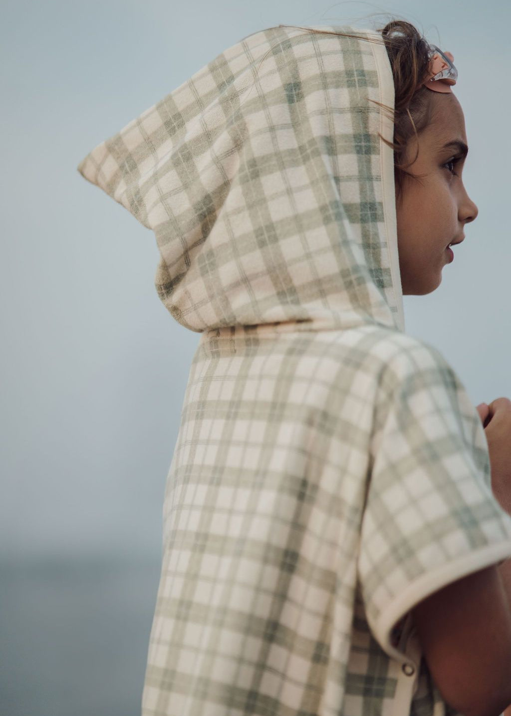 Kids hooded beach poncho in organic cotton with Grech & Co logo embroidery