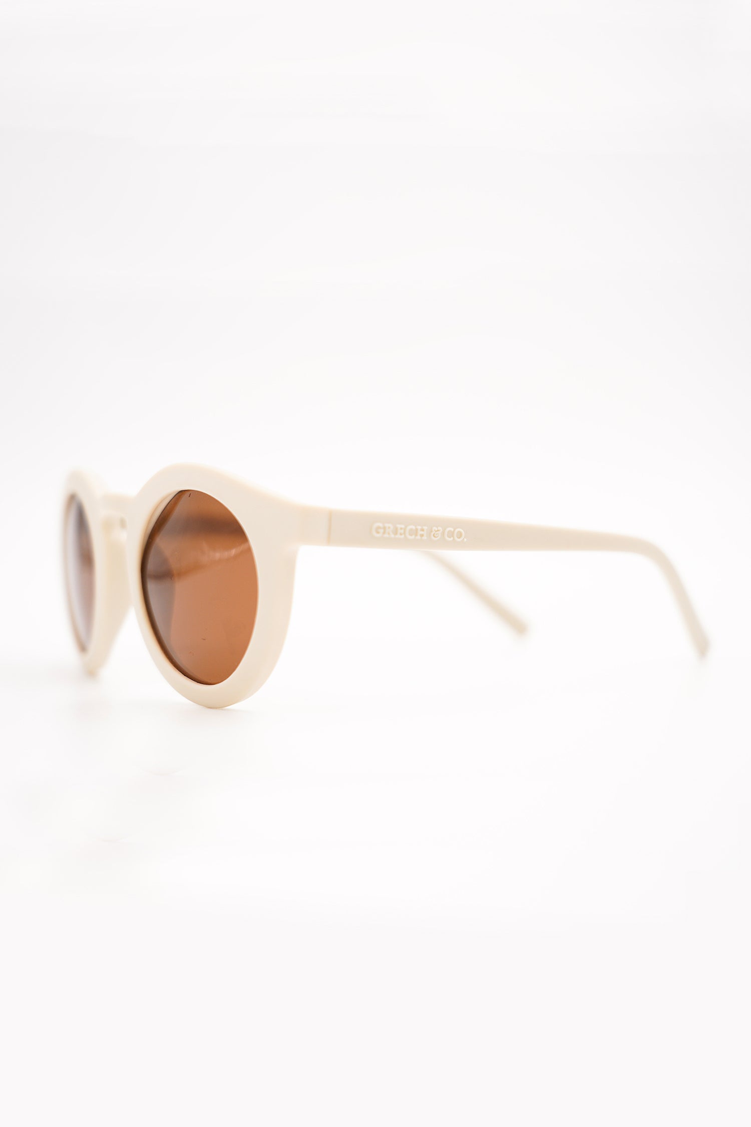 Sustainable kids sunglasses in white by Grech & Co at MiliMilu. Sustainable sunglasses are the best kids sunglasses with polarised lenses & UV400 protection.