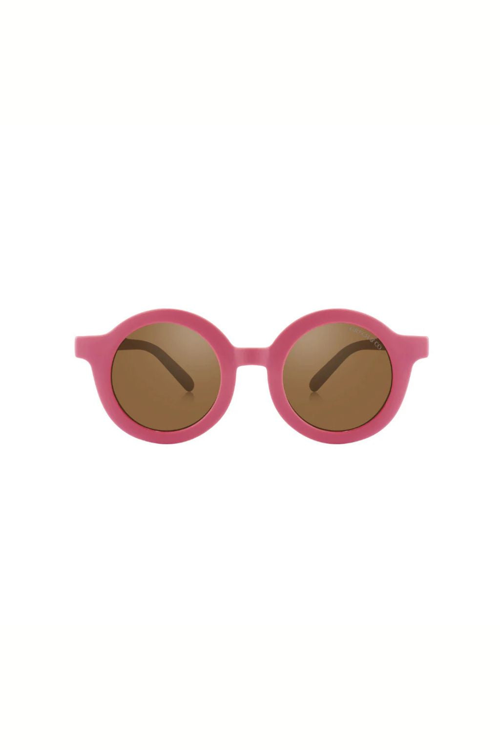 Sustainable kids sunglasses in bright pink by Grech & Co are made from eco-friendly break-resistant material - offering higher durability & longevity.