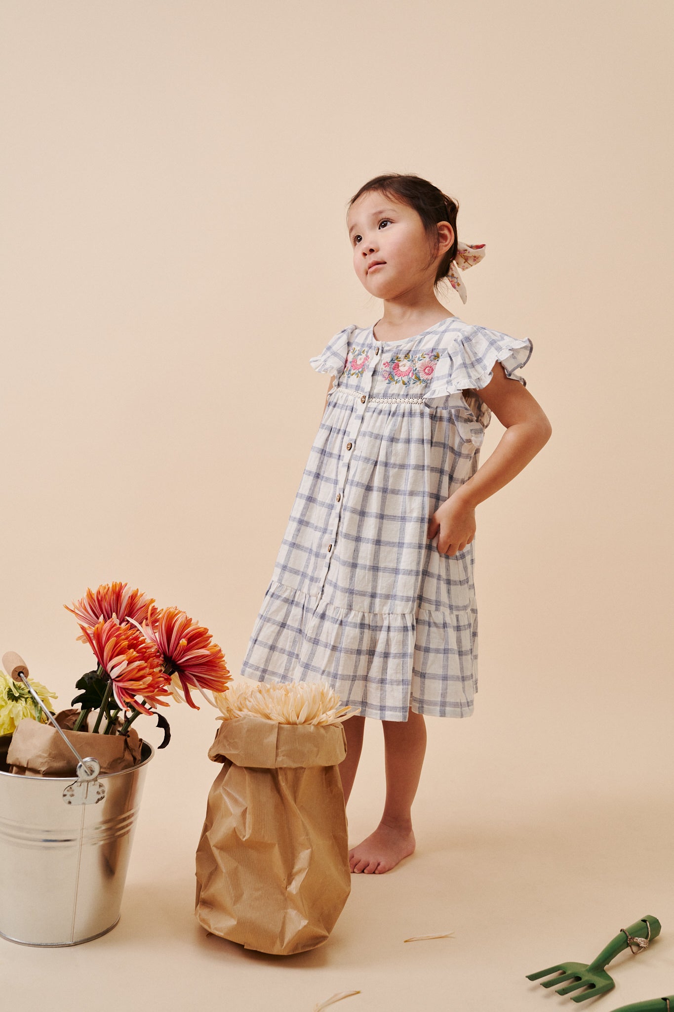 Girl summer dress - Caroline in blue river checkered pattern made from high-quality lightweight organic cotton by Louise Misha. Shop girls summer clothing.