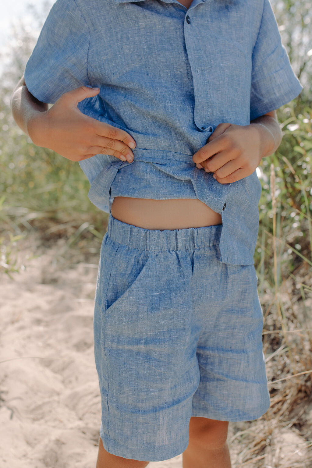 Premium blue linen shorts for boys - front view showing comfortable fit and breathable fabric.