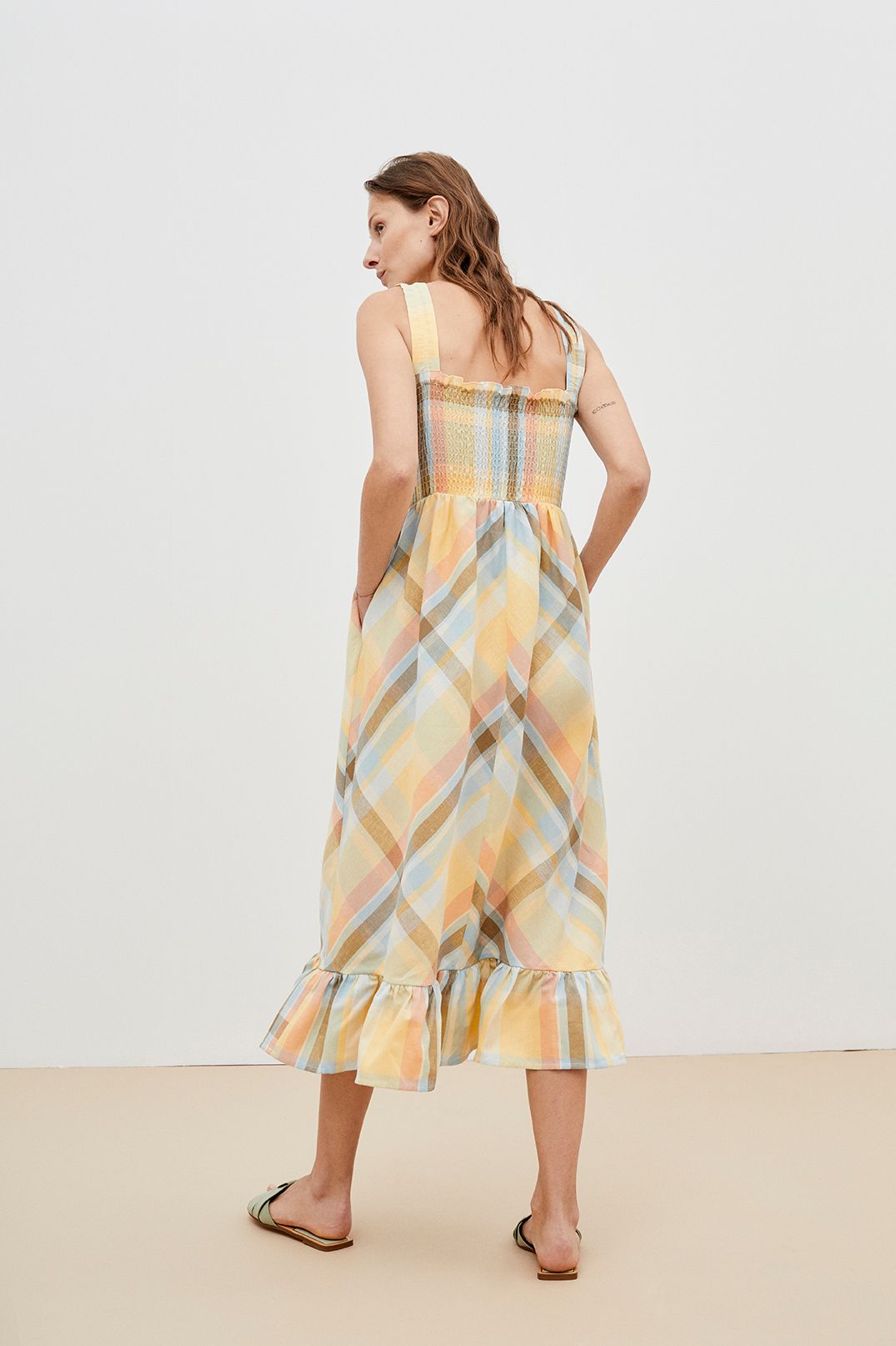 Breathable and lightweight organic cotton women summer dress is a flowy and feminine midi dress in checkered by The New Society. Sustainable women fashion.