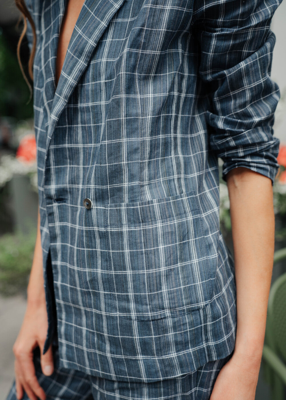 Premium linen blazer London close-up of sustainable fabric texture and the checkered print