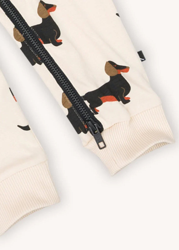 Organic cotton baby onesie with long sleeves and zipper with dachshund print. MiliMilu Lifestyle offers organic cotton baby clothing and baby Christmas gifts.