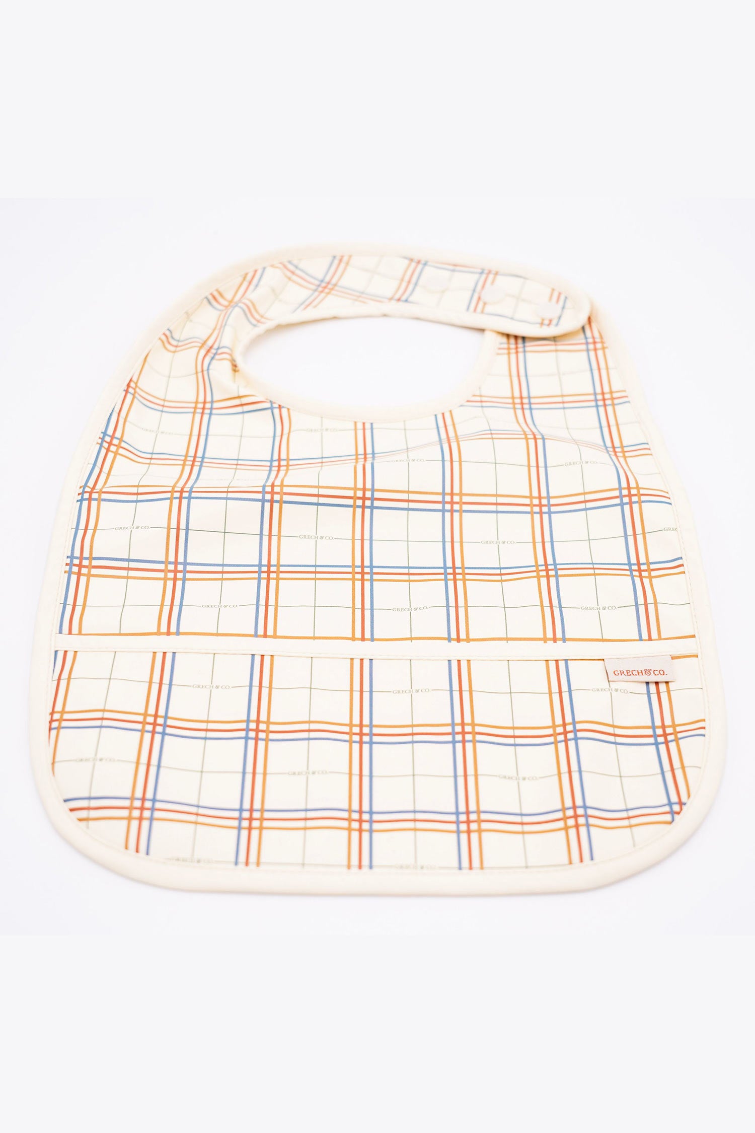 Sustainable baby bib in plaid pattern is water-resistant recycled Oeko tex material. Stylish and practical baby bib for being on the go. Best baby accesories