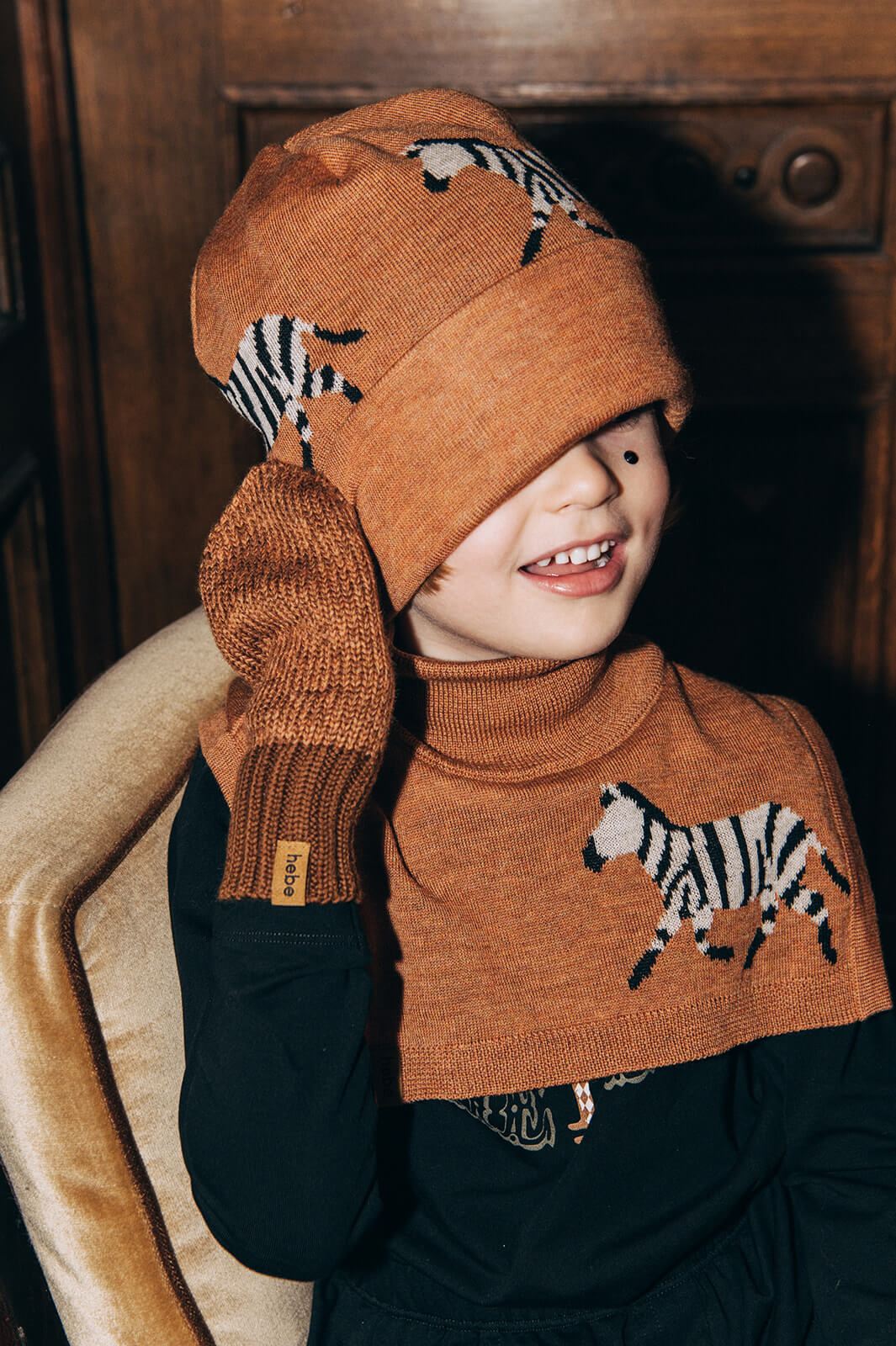 Shop this soft, breathable and stylish merino wool hat for kids with a cool zebra print online. This Merin wool kids beany keeps your child warm during winter.