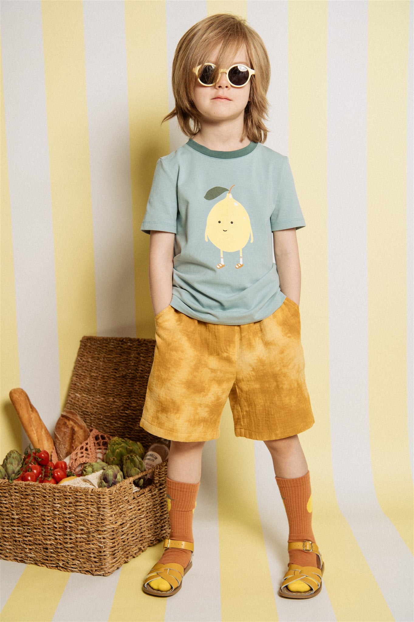 A breathable, organic cotton kid's summer t-shirt with lemon print is comfortable and stylish. Mini Me t-shirts & whole family matching t-shirts are available.
