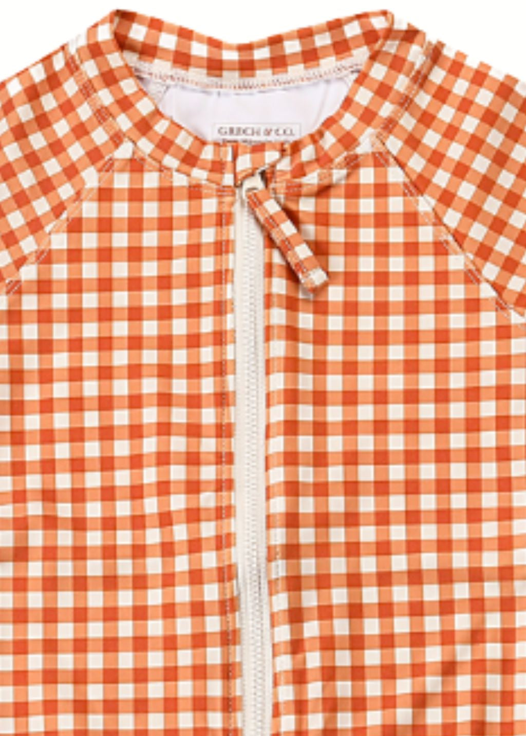 Girl wearing long sleeve swimsuit - Sienna Gingham rashguard with ruffle