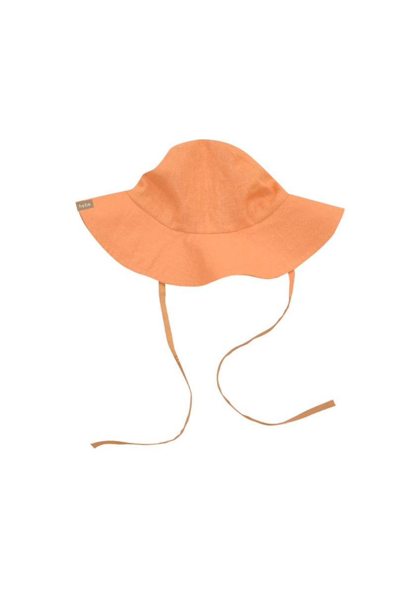 Close-up of orange linen sun hat with straps - European linen kids summer hat from Gusto d'Italia collection