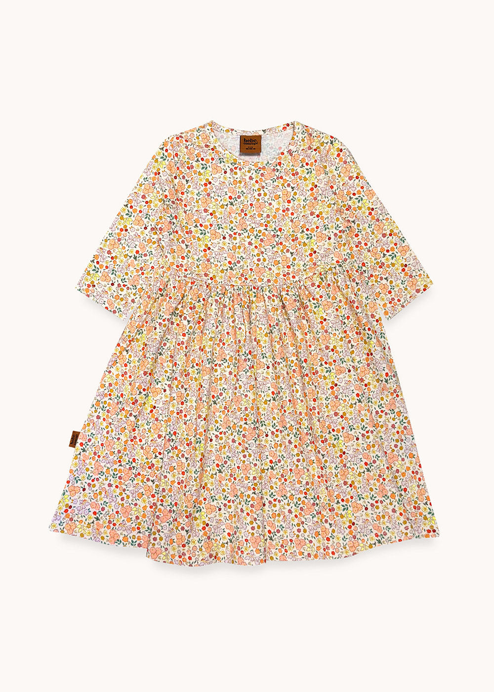 Flat lay of girls floral dress with all-over flower print – 95% organic cotton, OEKO-TEX certified, made in Latvia