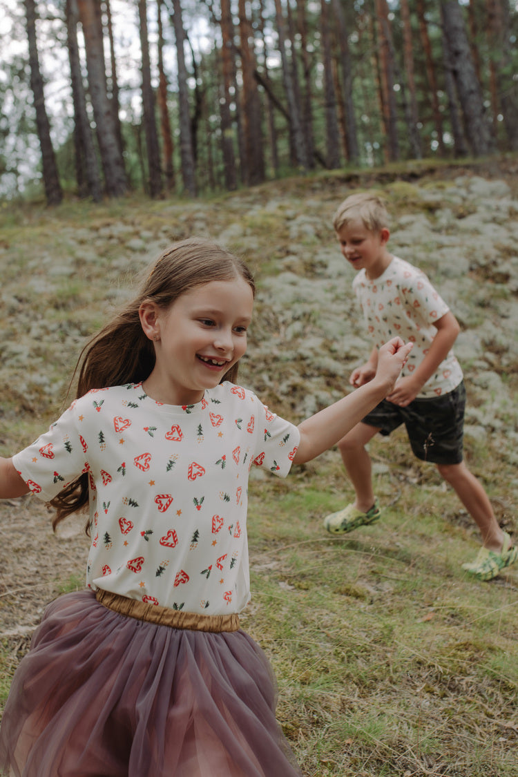 Child wearing Sweet Christmas bamboo t-shirt - soft kids festive tee in beige