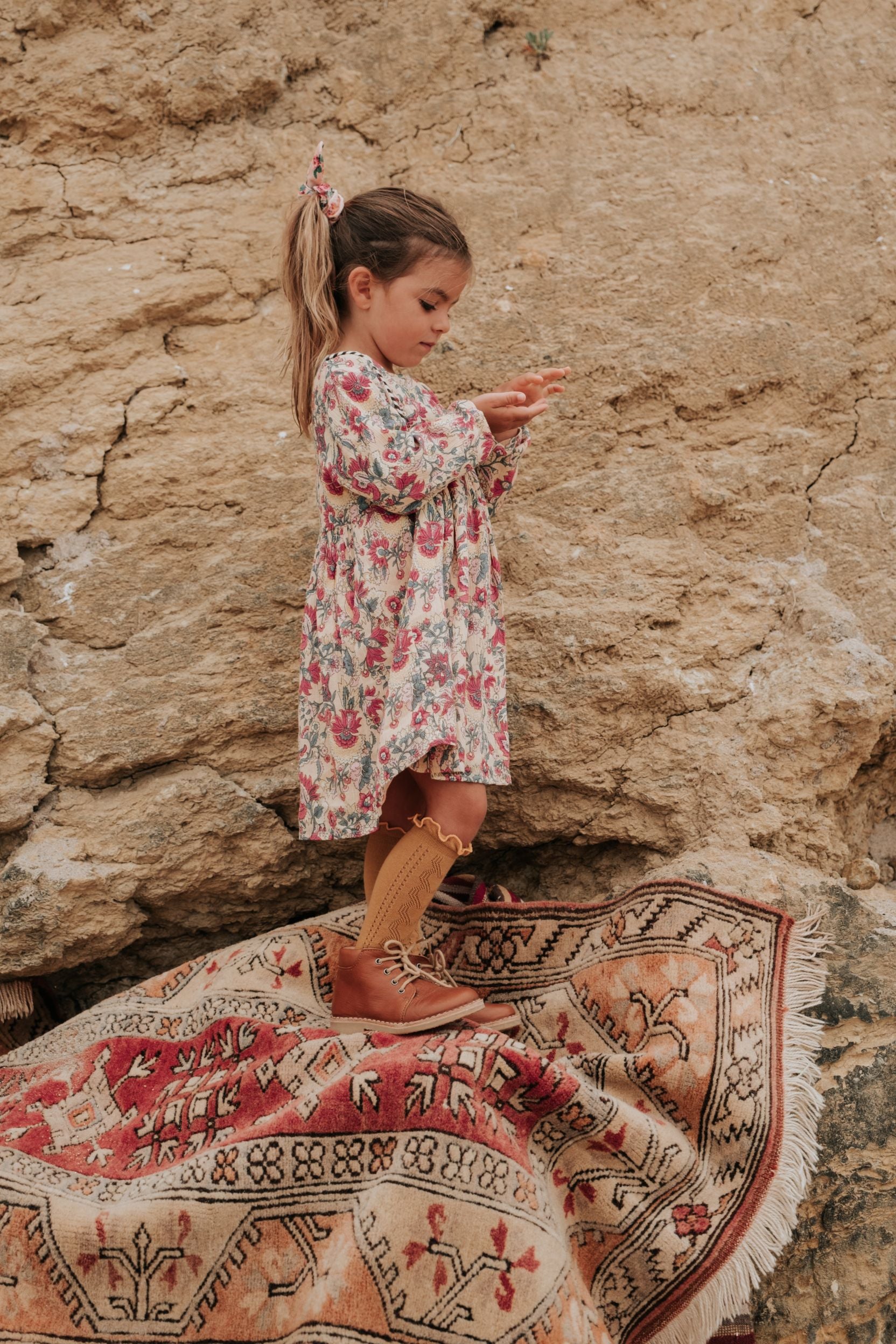 Shop organic cotton girls dresses with bohemian flowers by Louise Misha online in Hong Kong and Singapore. Best girls dresses and girls clothing at MiliMilu.