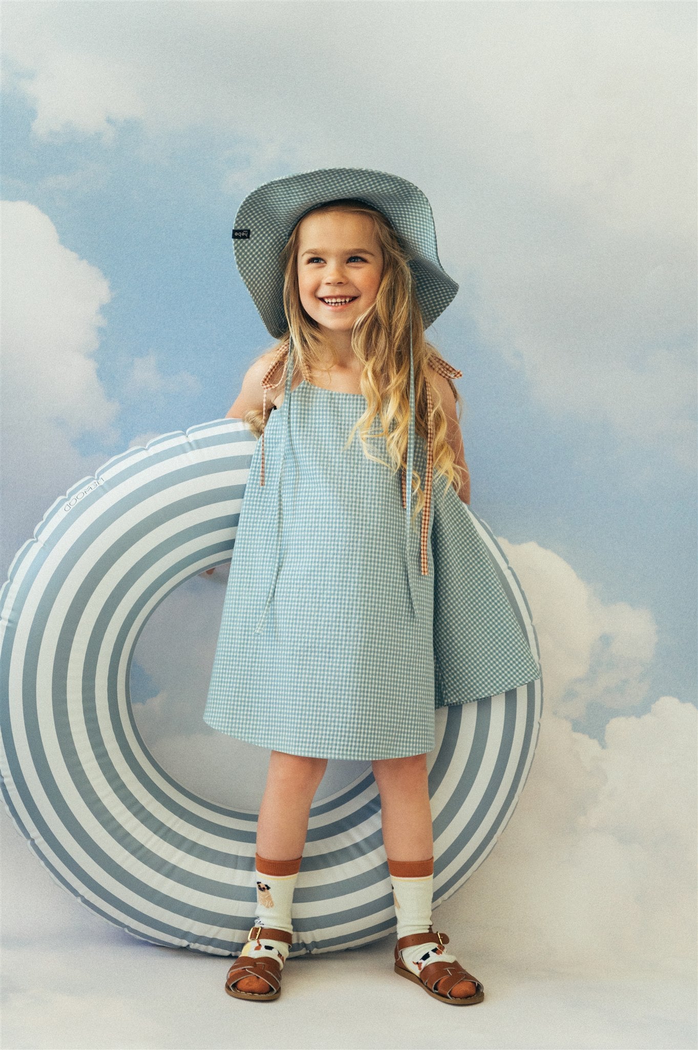 Shop the best girl summer dress from lightweight and breathable cotton in checked Mint print, this dress is adjustable and will grow with your child.