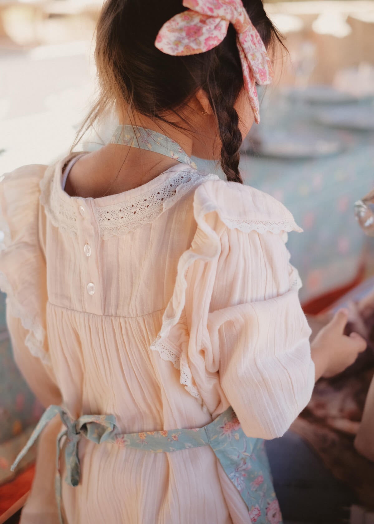 Mother and daughter matching floral aprons in organic cotton by Louise Misha | MiliMilu HK SG