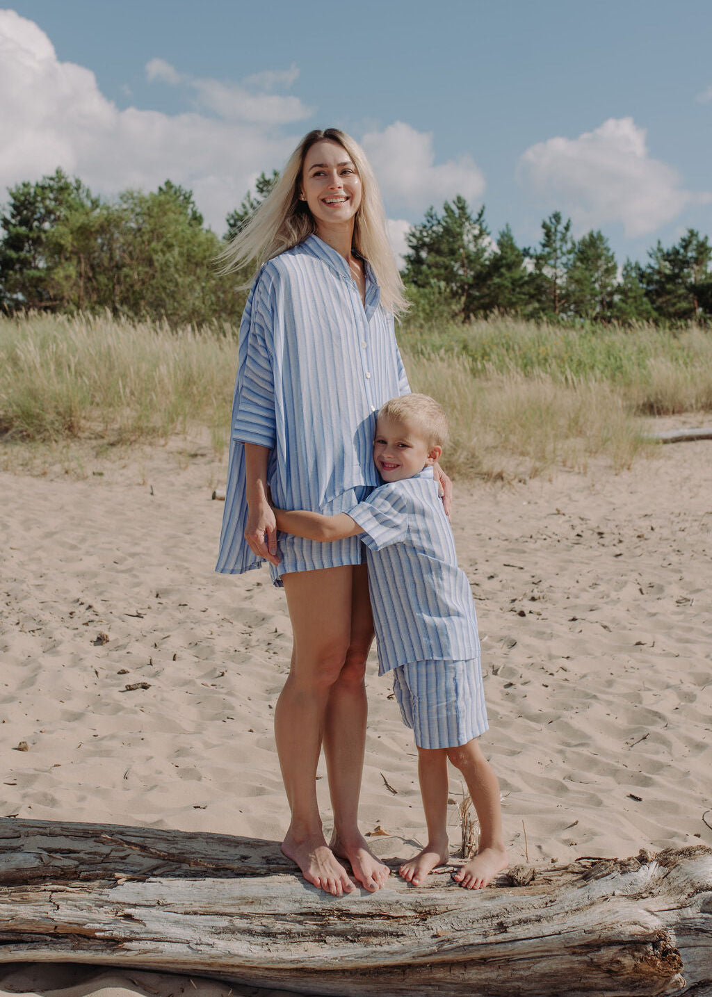 Mommy and son matching linen shirts blue and white striped coordinating outfits for family photos