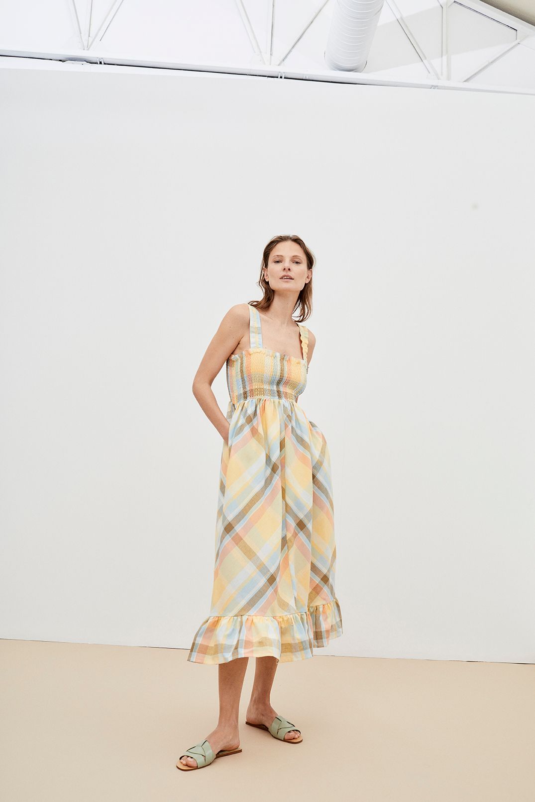 Breathable and lightweight organic cotton women summer dress is a flowy and feminine midi dress in checkered by The New Society. Sustainable women fashion.