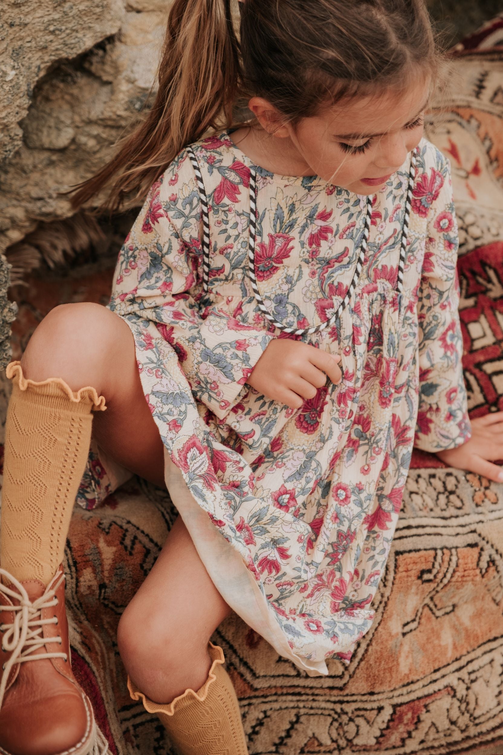 Shop organic cotton girls dresses with bohemian flowers by Louise Misha online in Hong Kong and Singapore. Best girls dresses and girls clothing at MiliMilu.
