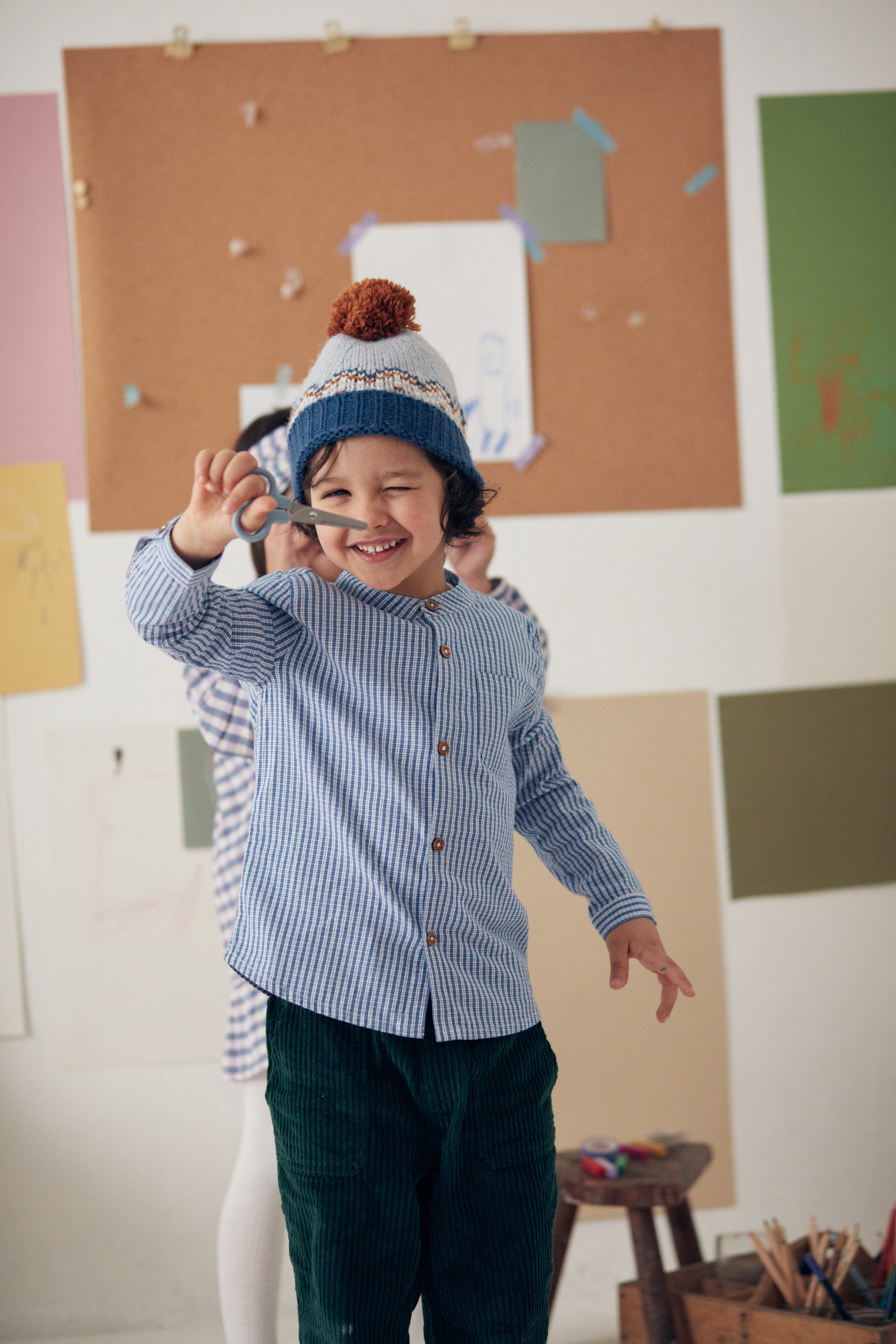 Formal boys shirt with modern twist, this organic cotton boys shirt with blue and white checkers is trendy by Louise Misha sustainable kids clothing online.