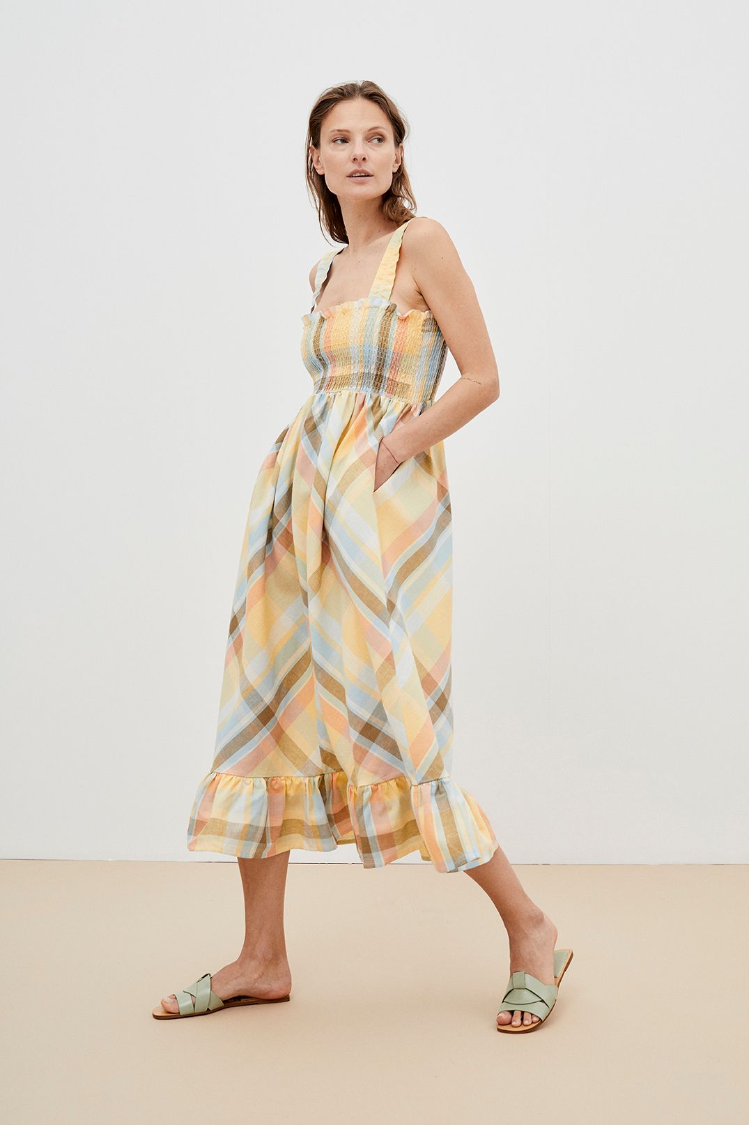 Breathable and lightweight organic cotton women summer dress is a flowy and feminine midi dress in checkered by The New Society. Sustainable women fashion.
