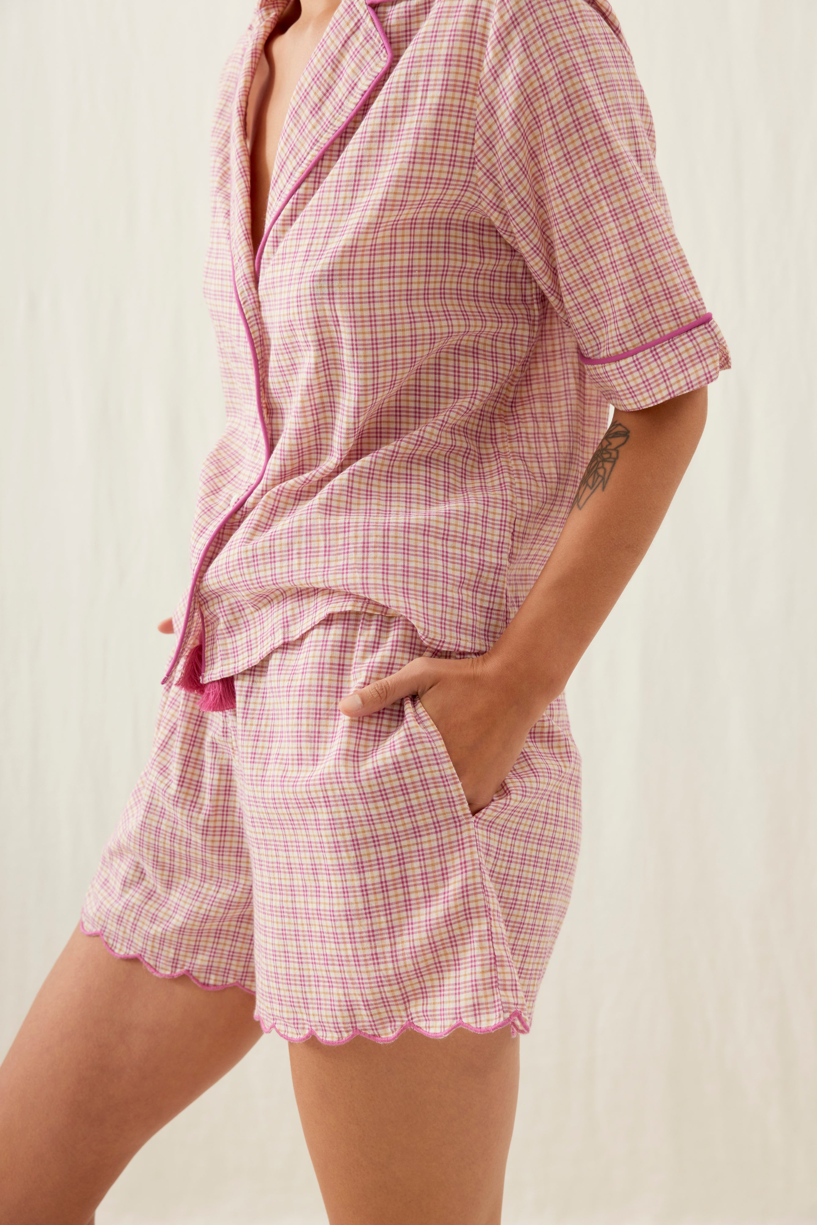 Organic cotton women pyjamas set by Louise Misha in fusia. The set includes shorts and a summery top. Shop the best summer pajamas online at MiliMilu.