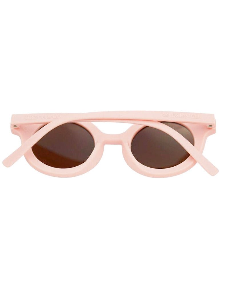 Close-up of blush pink kids sunglasses - flexible break-resistant polarized lenses by Grech & Co