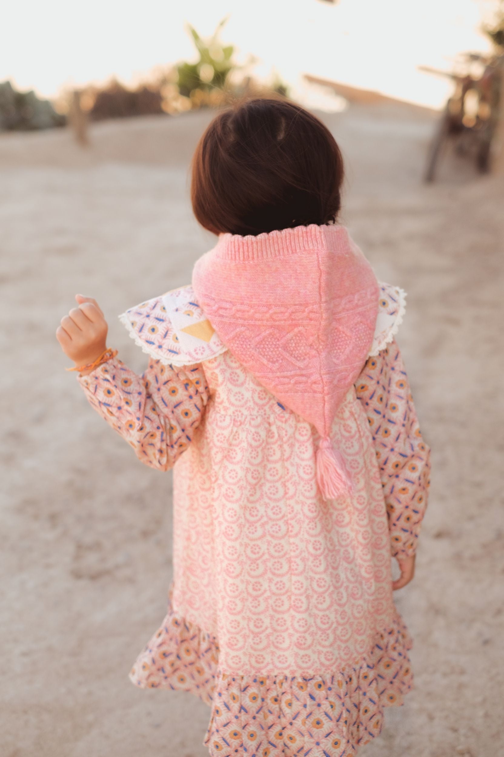 Girls pink merino wool hood close up, scalloped edges and knit details