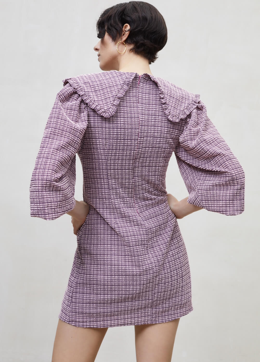 Checkered women's dresses online. This beautiful checkered women mini dress with an oversized collar and favourite balloon sleeves in purple colour.