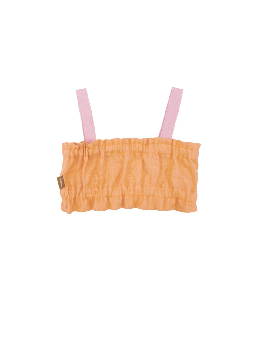 The sustainable and breathable girl's linen cropped top in orange colour will be your favorite top this summer. This top is stylish, and comfortable and will fit more than one season, it is made from high-quality European linen without any harmful chemicals. Milimilu offers sustainable clothing for kids and teens.