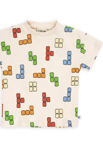 Shop the Blox Crewneck White T-Shirt is a must-have for every kid's wardrobe. With its classic Tetris-style print t-shirt it's perfect for game-loving kids. Tailored for boys and teenagers, the collection offers a vibrant array of colors to ensure they stand out - unique kids clothing. Organic cotton t-shirt for kids.