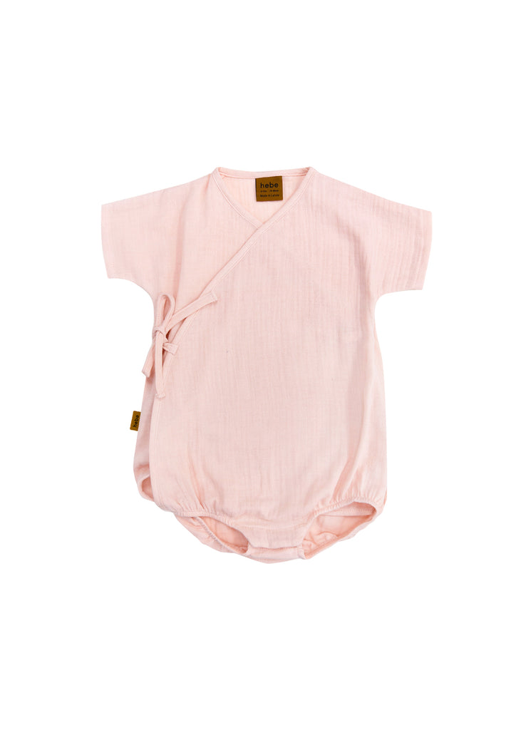 Shop the breathable pink muslin wrap body is perfect for summer weather. This baby girl romper can be adjusted for thingness and comes with snap bottom's at bottom for easy wear. This pink baby romper is made from muslin which is the perfect choice for baby clothing during summer. Shop the best baby clothing online.