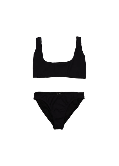 Shop black bikini set for women, made from recycled fabric with stylish texture online and add to your beachwear capsule wardrobe with timeless black bikini. Crafted with care in fair trade production by The New Society ensures this swimwear for women is an eco-conscious choice. Shop the best women swimwear online.