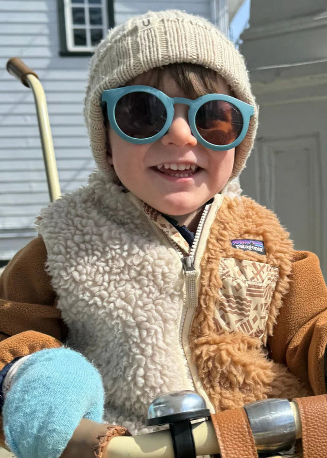Sustainable sunglasses in blue are made with eco-friendly/non-toxic break-resistant material with polarised lenses & UV400. Family matching sunglasses available