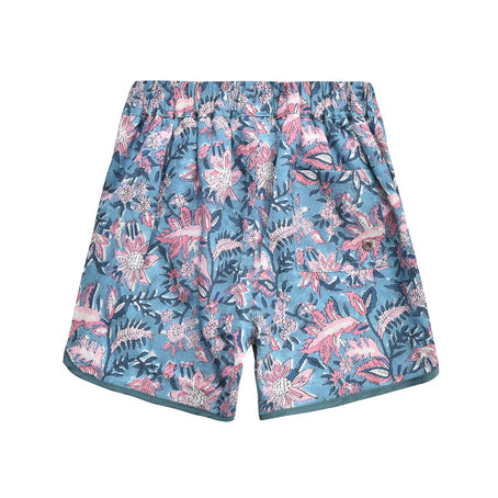 Boy swim trunks in blue, these swim shorts provide SPF 50 sun protection by Louise Misha. Shop best kids sustainable swimwear online and gifts online.