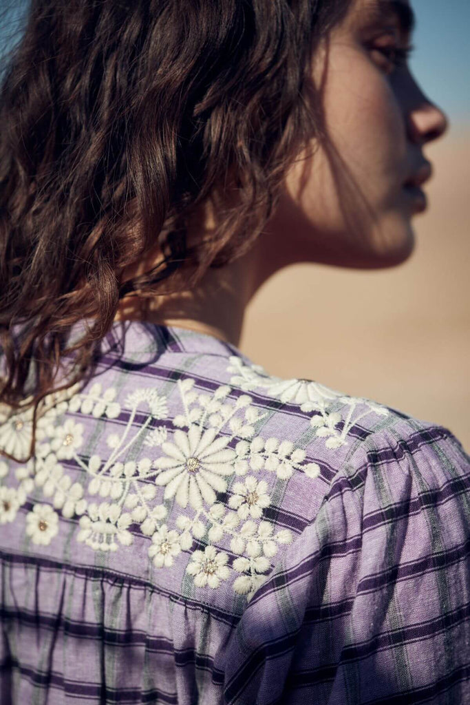 The most loved women's blouse, Jeanne it, beams with its purple checks made of yarn-dyed fabric adorned with embroideries and with the most beautiful details by Louise Misha. Mini Me matching with boy and girl is available. Shop this stunning women's blouse online in Hong Kong and Singapore at MiliMilu.