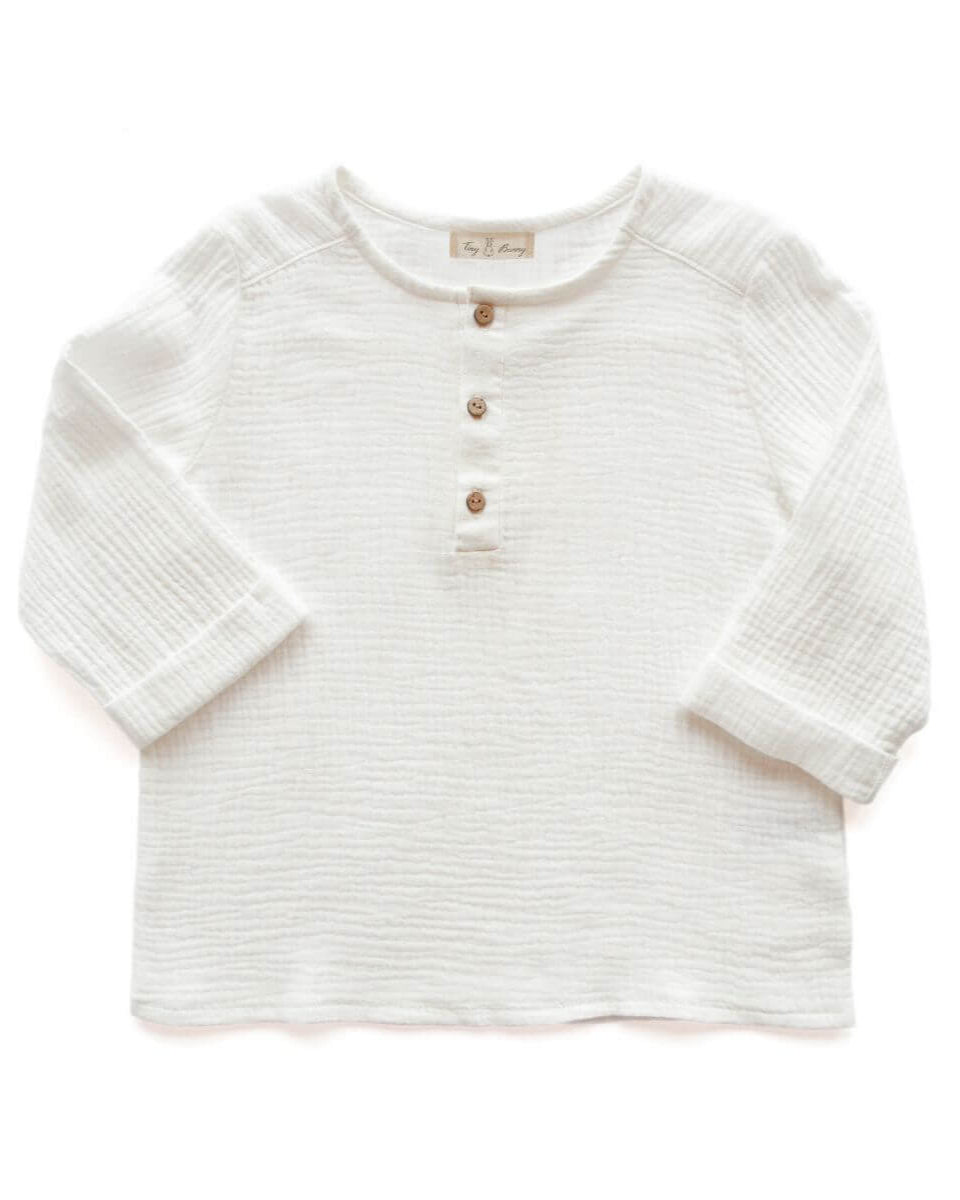 Handmade kids muslin shirt in white is made from organic cotton and is breathable and lightweight, the best clothing for hot and humid weather.