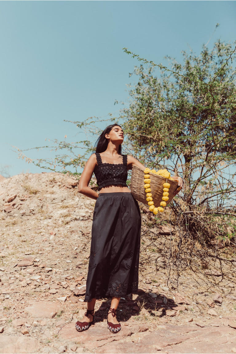 Women black cropped top Kivima with most beautiful embroidery details and is made with organic cotton by Louise Misha. Shop sustainable women fashion online.