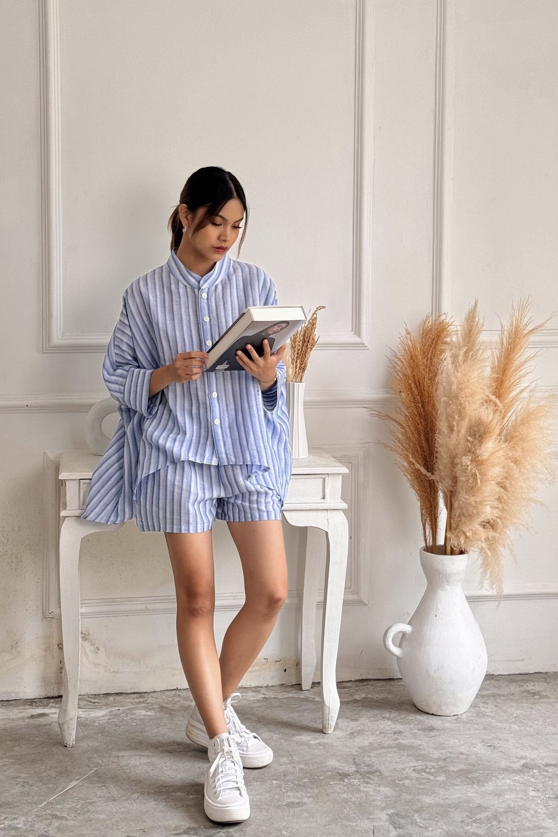 Oversized blue and white stripes women shirt and line short set for modern women.