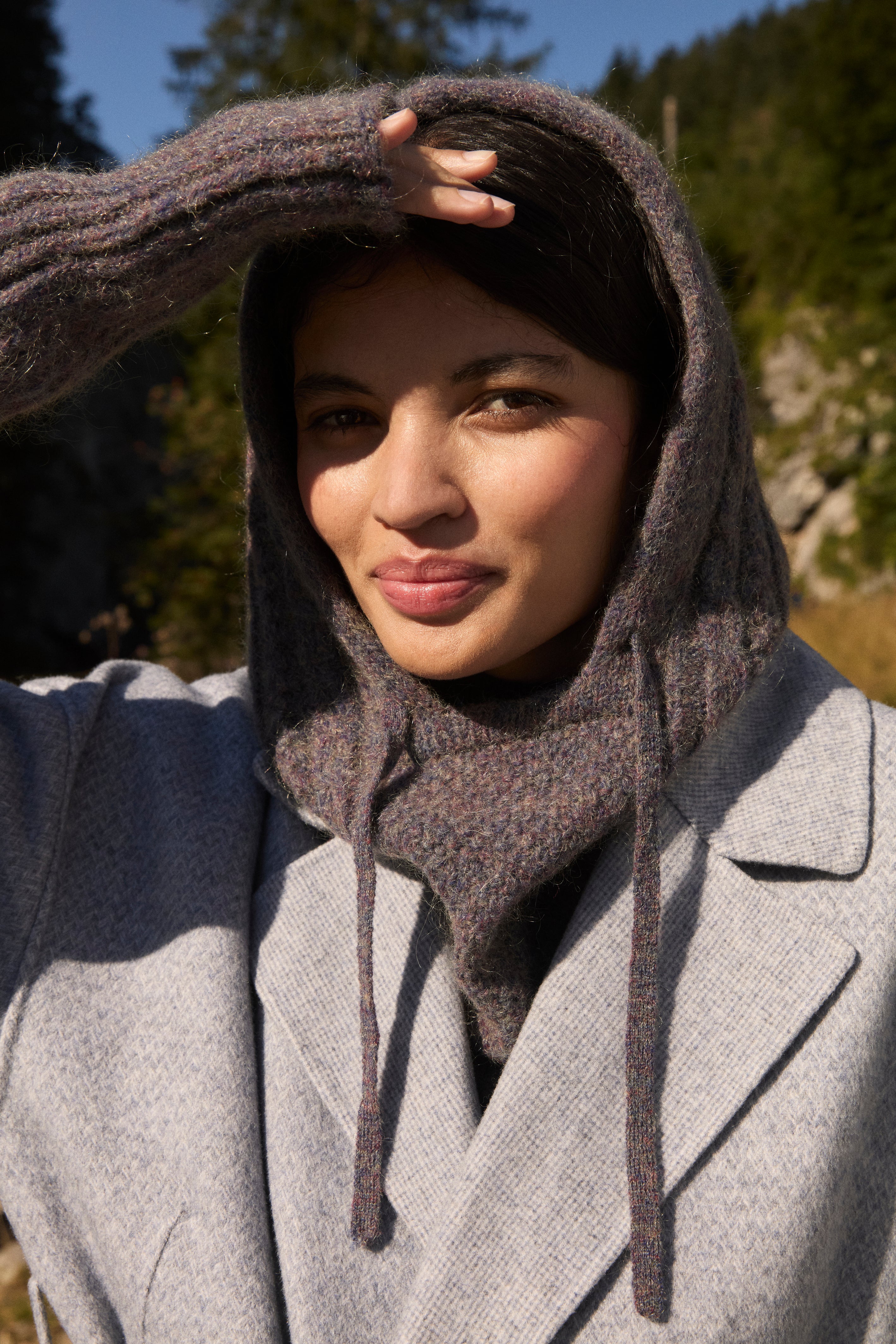Sustainable women fashion from Louise Misha and women merino wool hood in storm colour. Practical and trendy women winter accesory, sustainable Christmas gift.