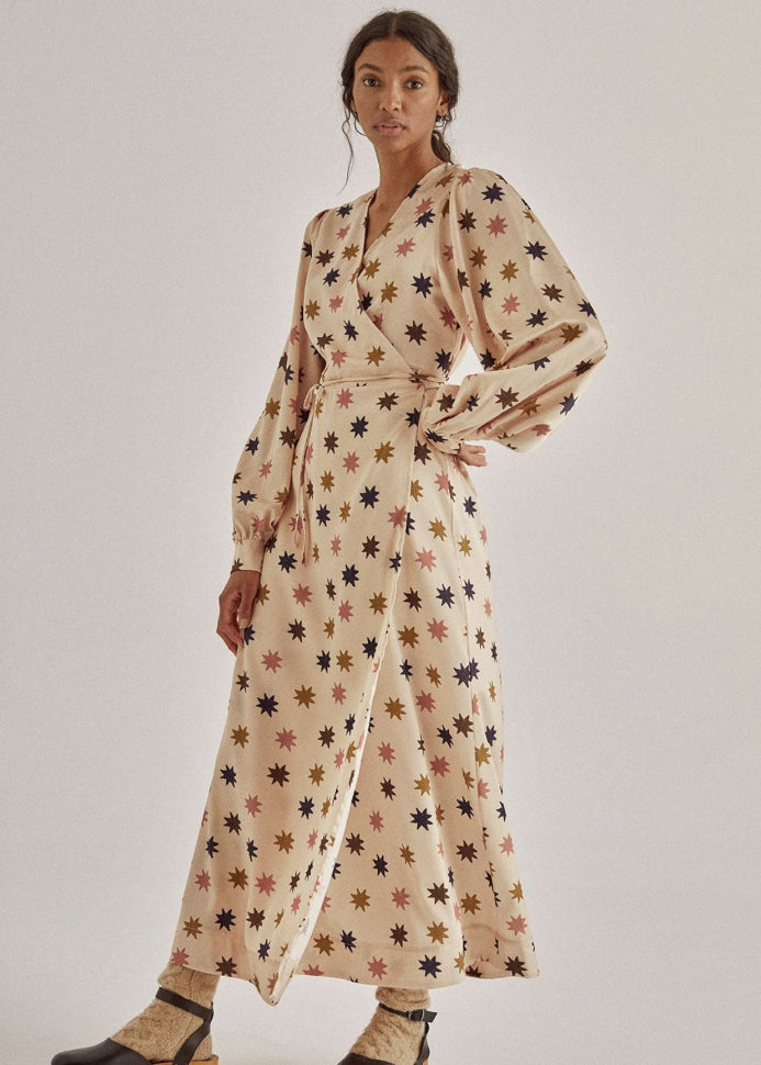 The New Society Daria wrap midi dress in metallic star print — recycled polyester, made in Portugal