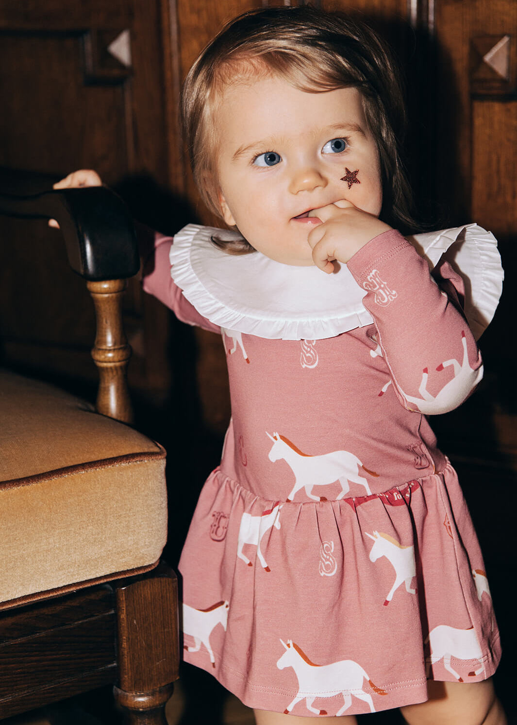 Close-up of white ruffled baby collar - Oeko-Tex certified organic cotton made for kids