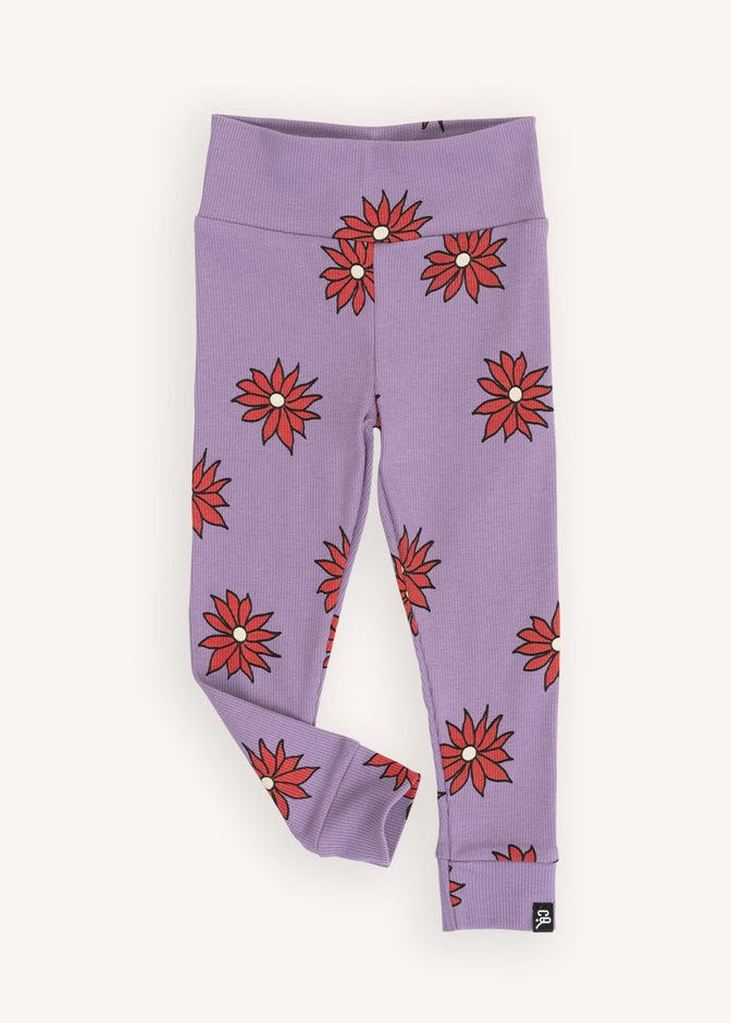 : "Baby wearing purple dahlia print organic cotton leggings by CarlijnQ.