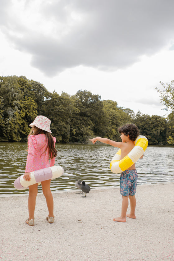 Boy swim trunks in blue, these swim shorts provide SPF 50 sun protection by Louise Misha. Shop best kids sustainable swimwear online and gifts online.