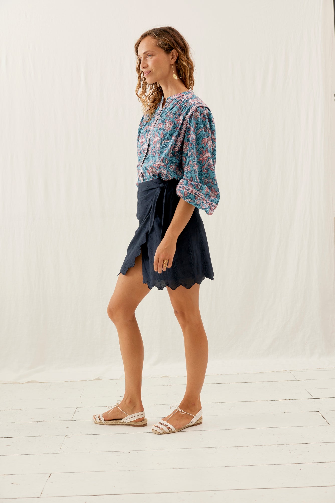 Shop the little black mini skirt Charlie with embroidery fabric and scalloped edges. The black mini skirt are made with breathable cotton by Louise Misha.