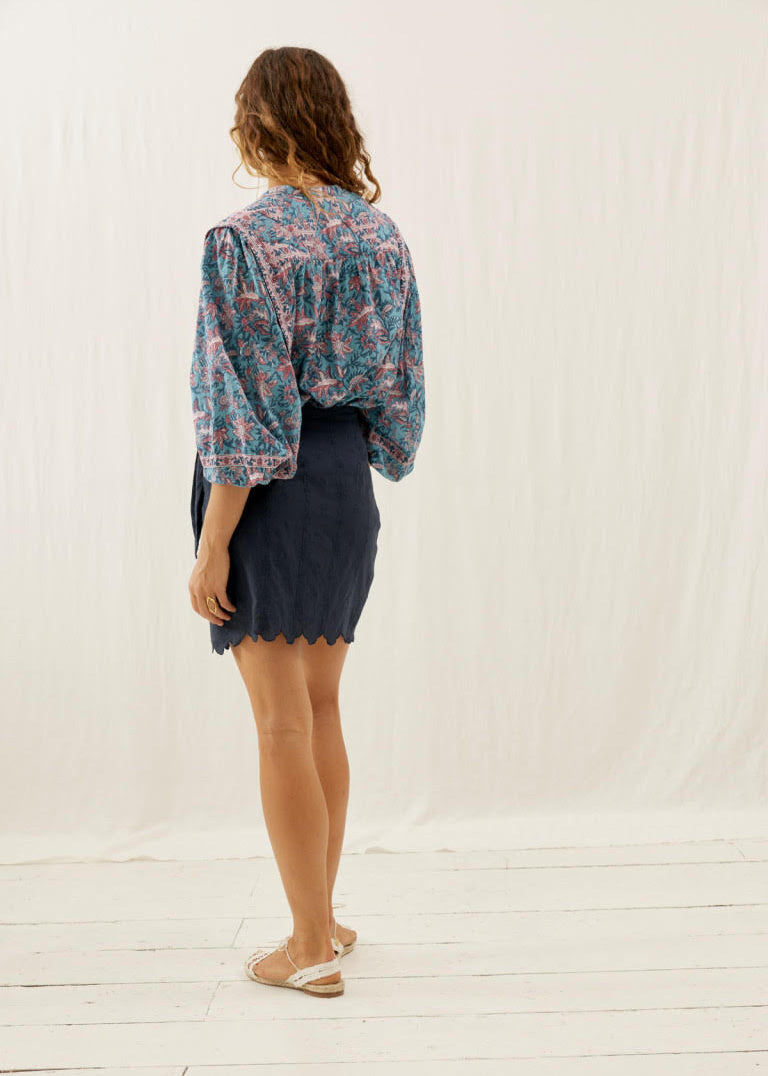 Close-up of Charlie skirt embroidery and scalloped edge – intricate artisanal detail by Louise Misha