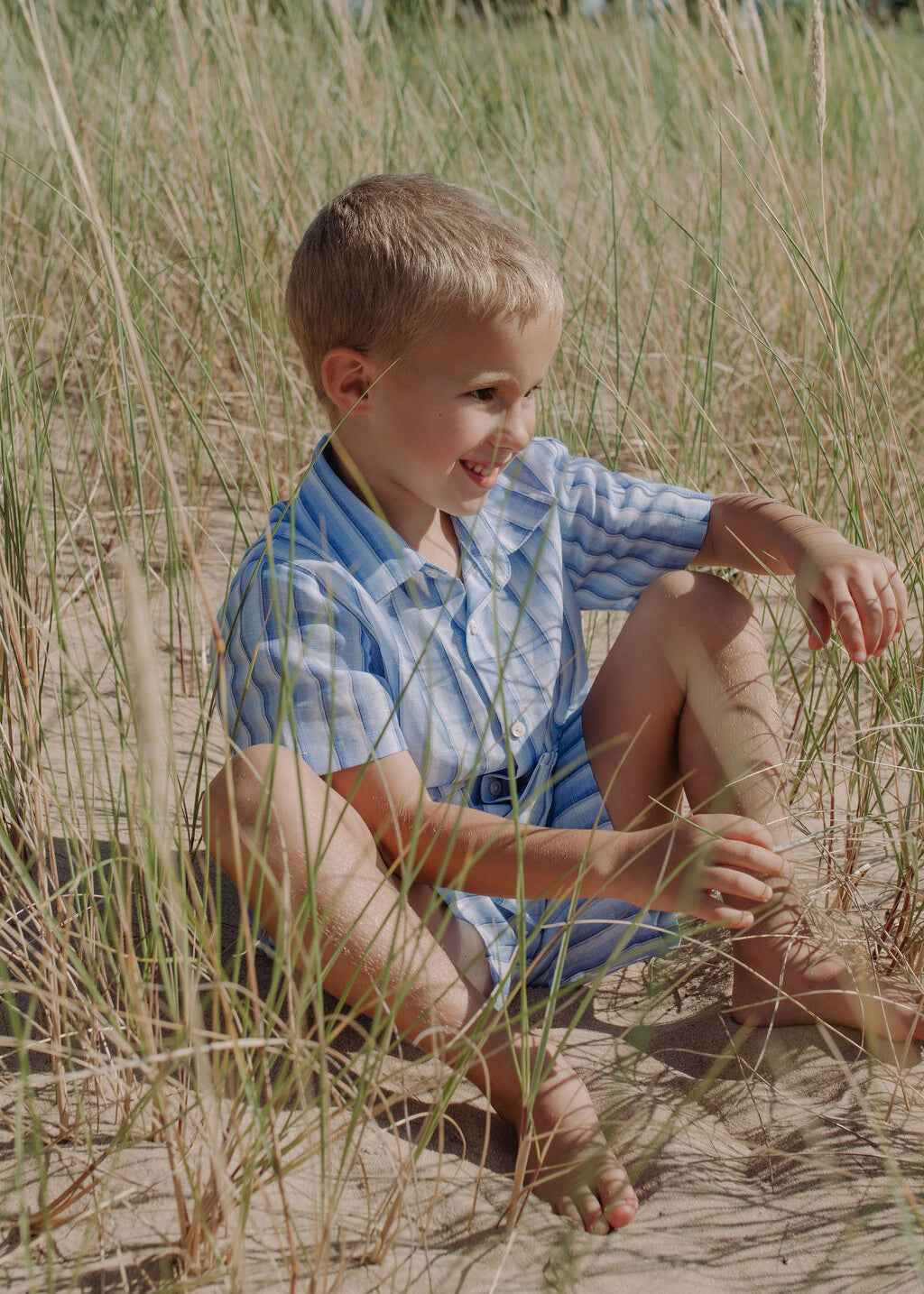 Boys linen set blue striped shirt paired with matching linen shorts for complete outfit