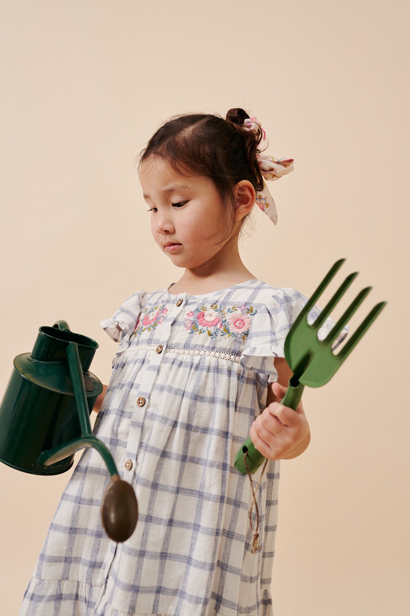 Girl summer dress - Caroline in blue river checkered pattern made from high-quality lightweight organic cotton by Louise Misha. Shop girls summer clothing.