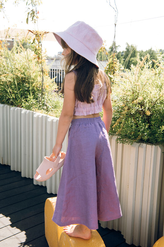 This kids bucket hat is the perfect choice for summer days, this lilacl linen bucket hat for kids is breathable and easy to wear hat that kids keep on.
