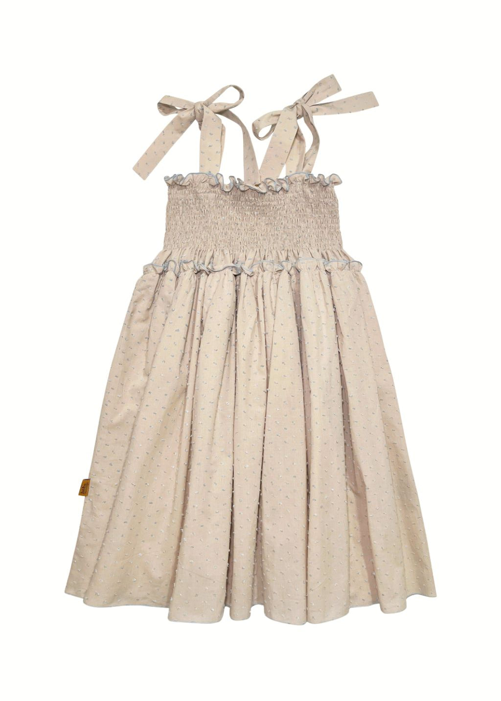 Close-up of Summer Breeze girls twirl dress in light taupe with dotted pattern